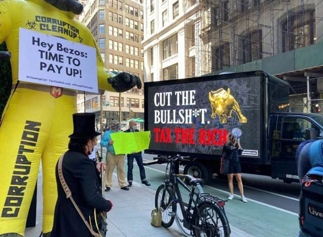 Billionaires protest outside Jeff Bezos' home, demanding more taxes