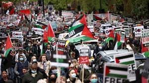 Thousands take to the streets in London and Paris to protest Israeli aggression against Palestine