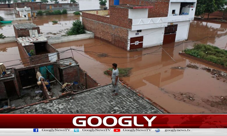 Flooding in the Sutlej River, dams broken, water entering settlements