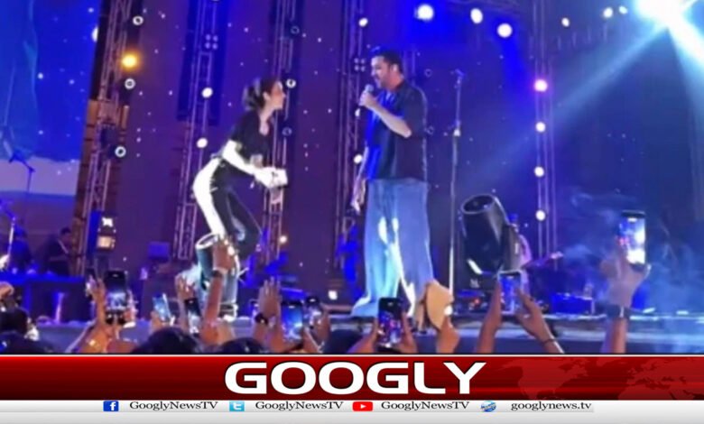 Female fan climbs onto stage during Atif Aslam's concert