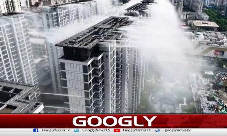 چین میں عمارت کی چھت سے ہونیوالی مصنوعی بارش برس گئی 1 Artificial rain was generated from a building's rooftop in China.